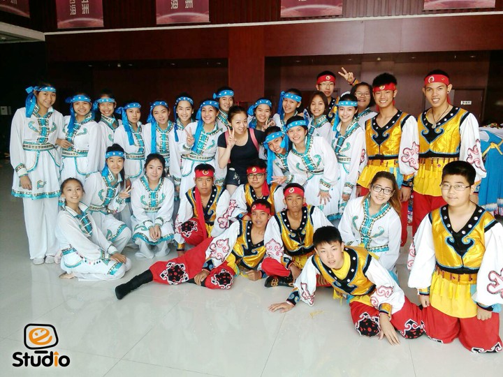 Students in traditional costumes